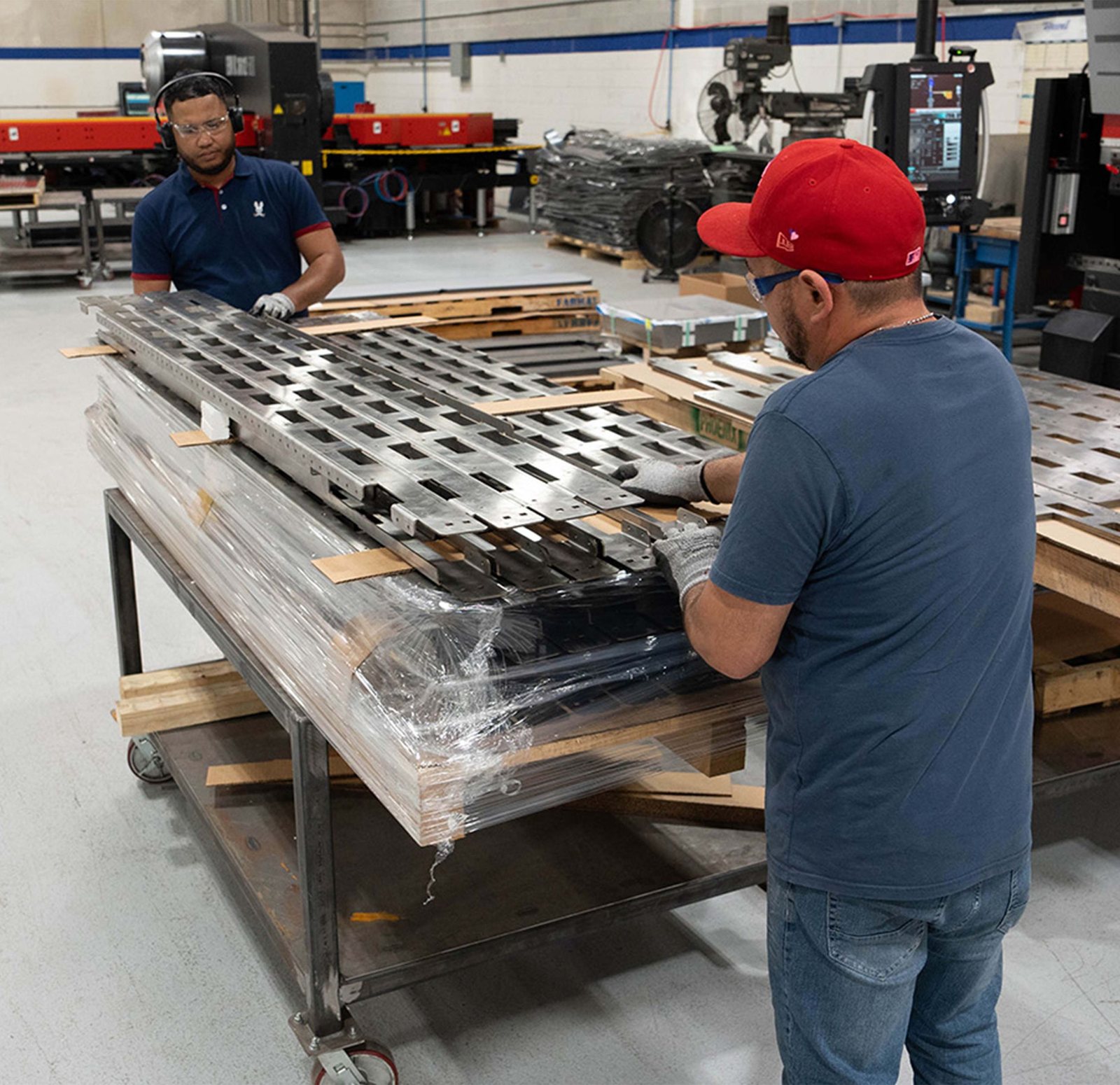 FABMAX team packaging finished assemblies for shipment
